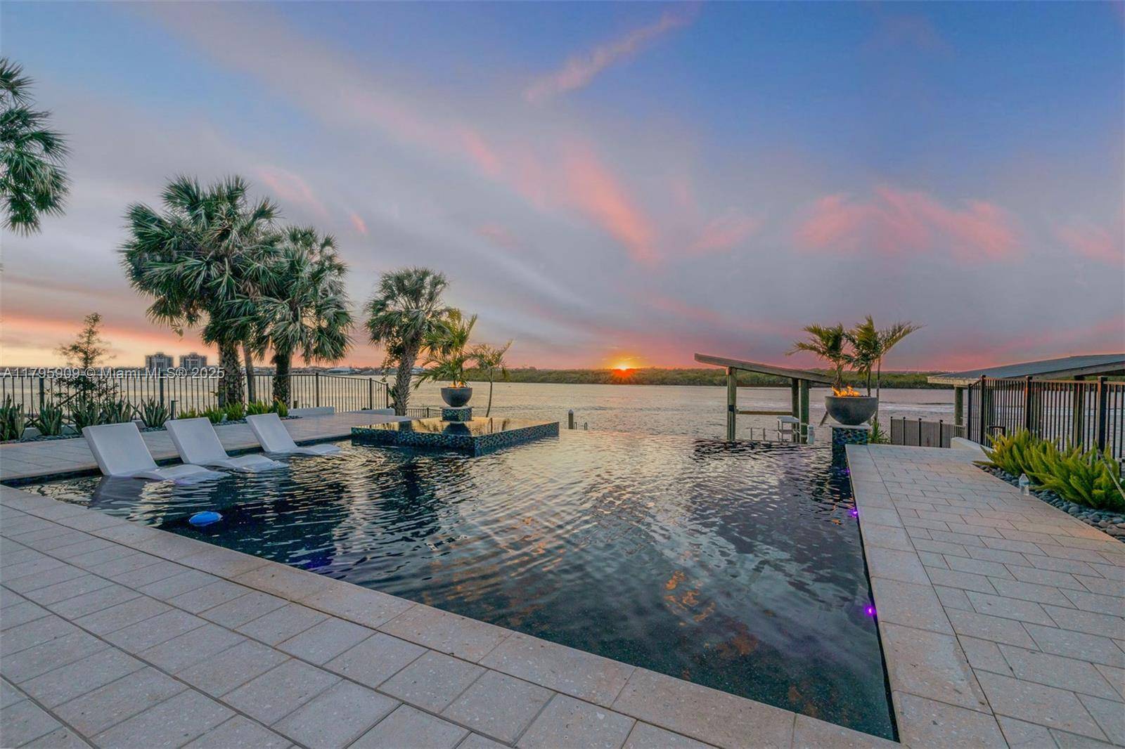 Year 2024 New Construction 5, 500 square foot under air, 5 bedroom, 5 bathroom beachside estate, complemented by 2 half baths.