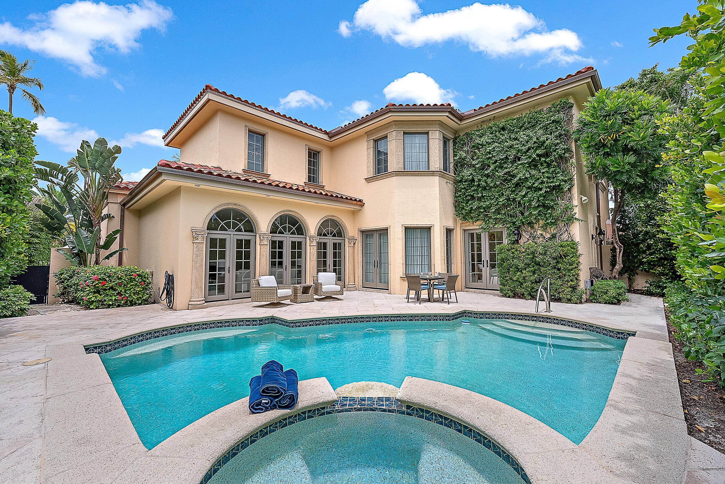 Perfectly positioned just two blocks from the world renowned shopping and dining of Worth Avenue, this exquisite 4 bedroom, 4.