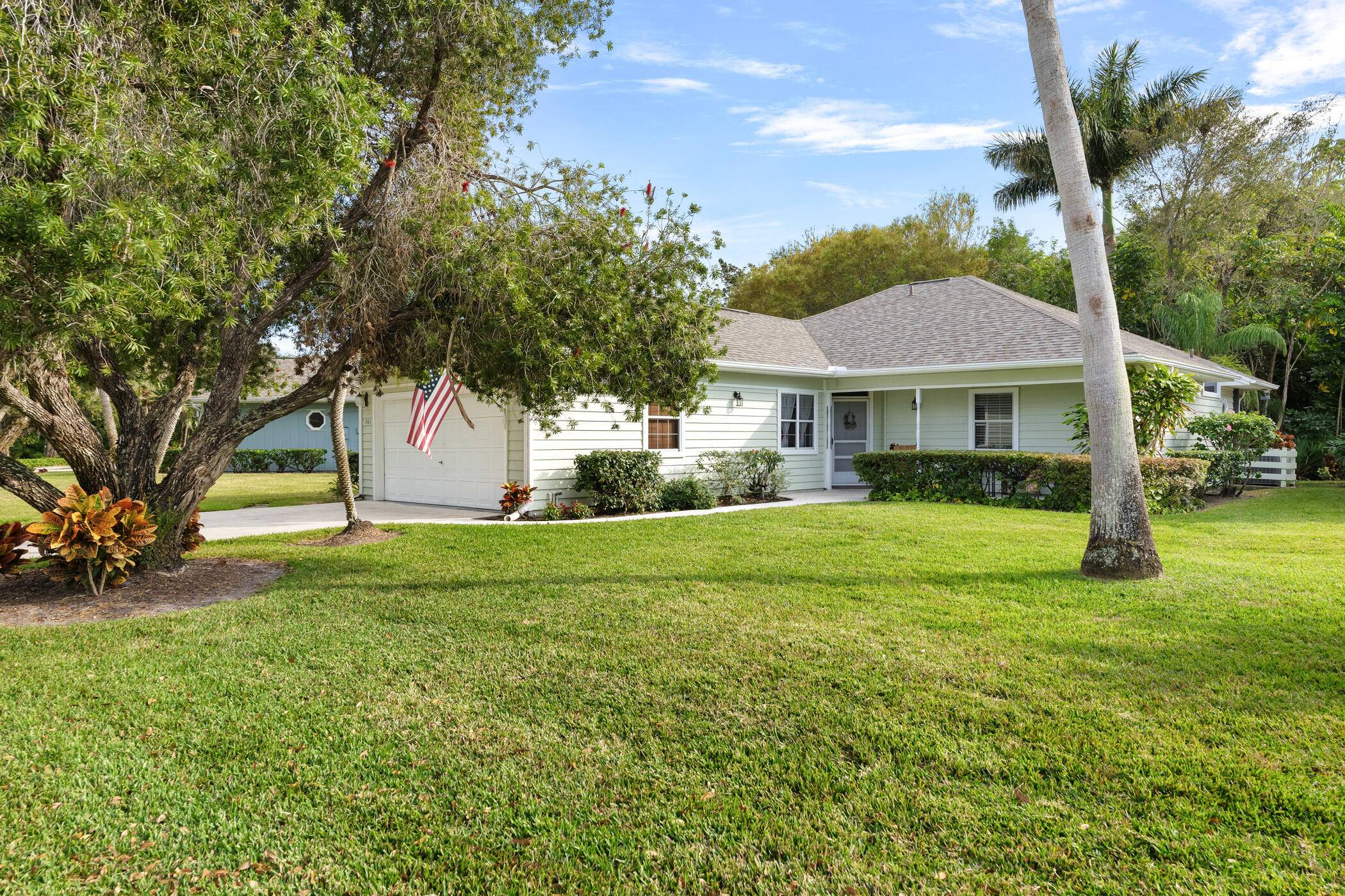 This is a gorgeous 2 bedroom 2 bath home, with oversized lot that backs up to private natural wooded area.
