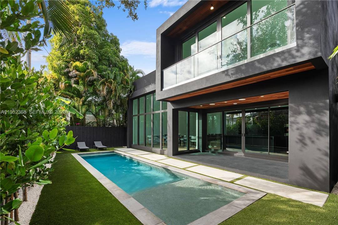A few blocks from The Miami Design District sits this new construction modern home with 3, 642 total SQ FT.