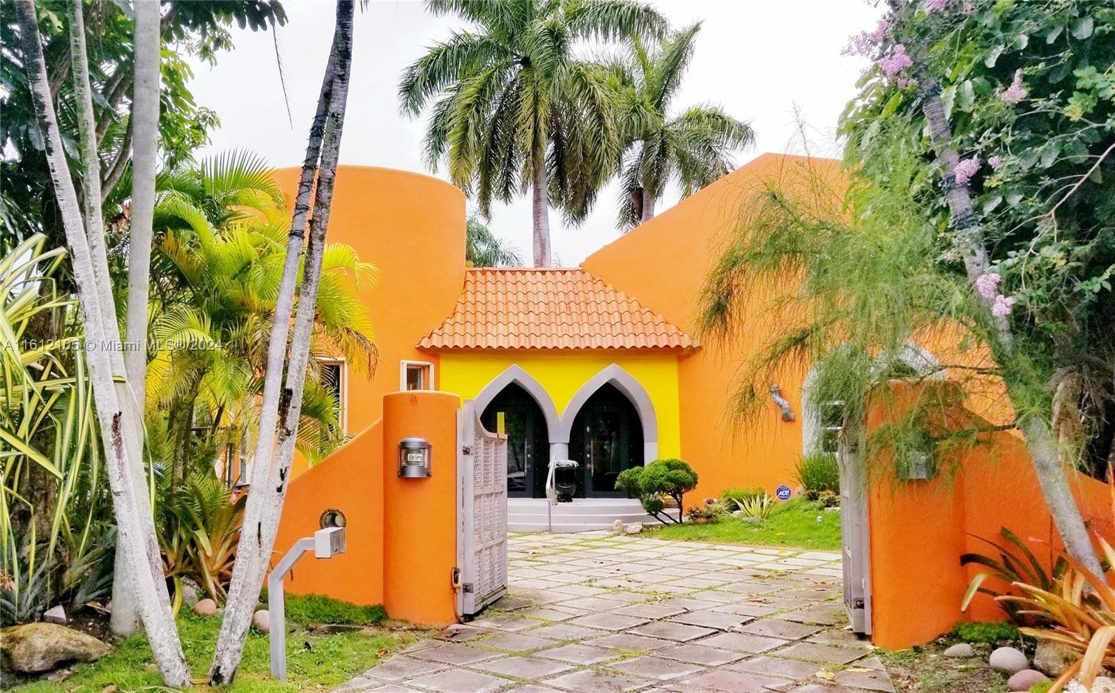 Nestled in the heart of South Miami, this Mediterranean gem is a true architectural masterpiece designed by architect Jose Anthony Enriquez.