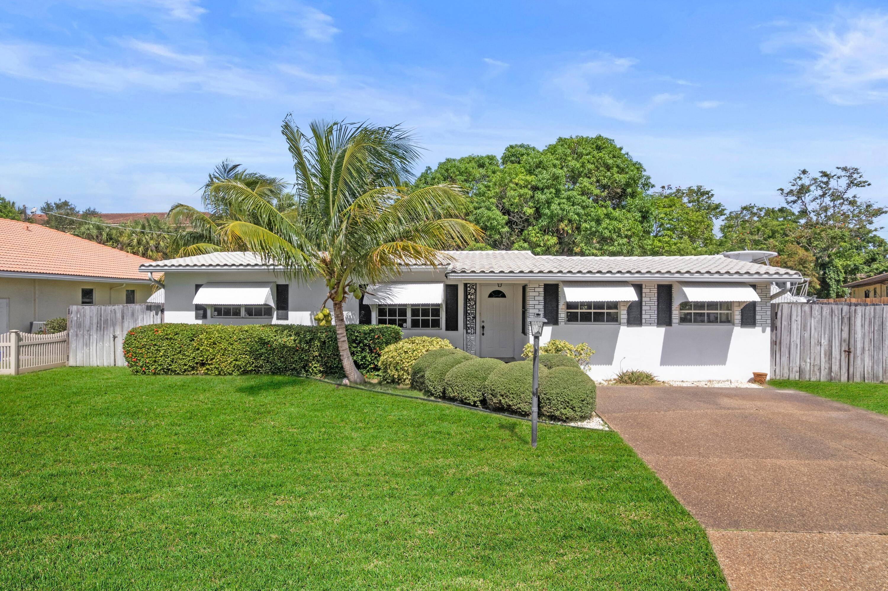 ABSOLUTELY GORGEOUS SINGLE FAMILY HOME PRIME EAST BOCA RATON LOCATION WALK BIKE TO TOP RATED SCHOOLS Oversized Lot No HOA Fee Immaculate Manicured Landscaping Bright Open Split Floor Plan Built ...