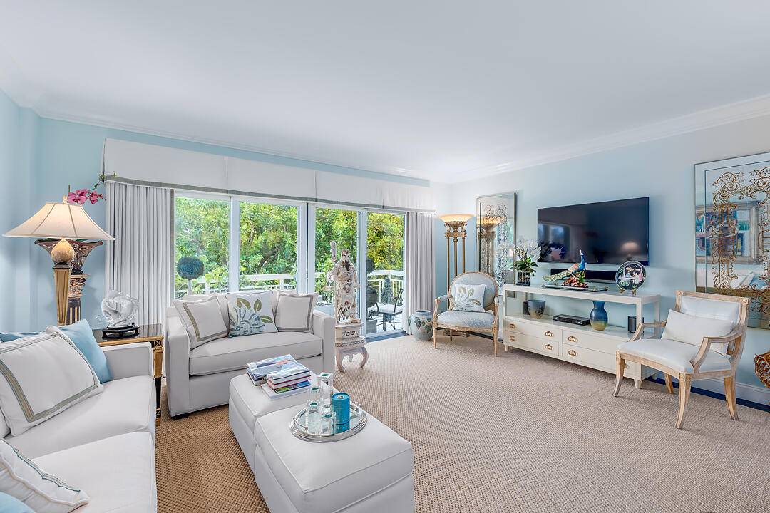 Perfect Palm, Beach large corner pied a terre with wrap balcony in 24 hr doorman bldg on Lake Trail with heated pool and onsite parking available JUNE 1, 2024 for ...
