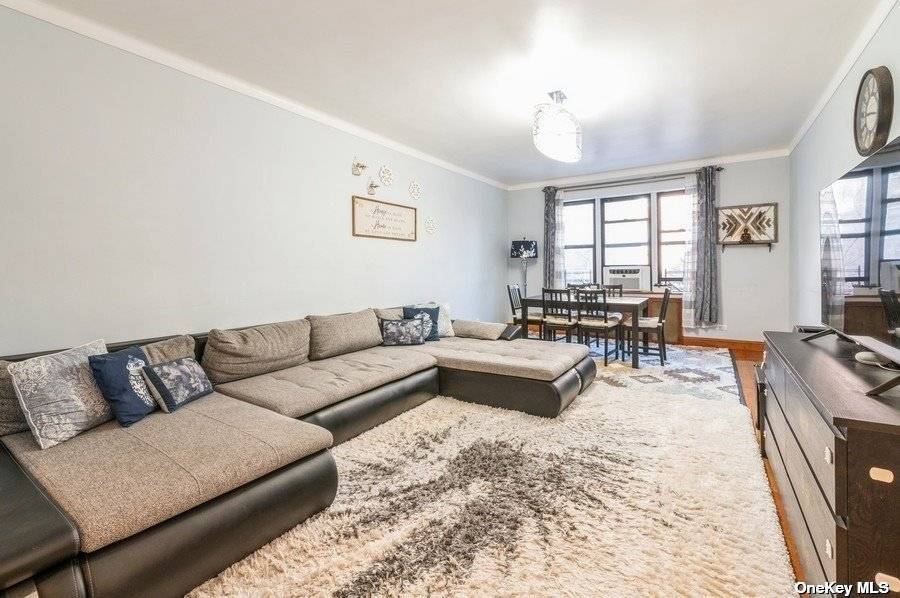 Nestled in the prestigious enclave of Queens, this elegant corner two bedroom, one bath residence in the heart of Forest Hills, offers a refined urban lifestyle.