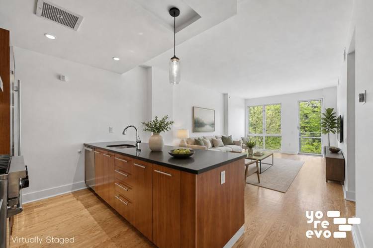 Welcome to apartment 3C at 415 Leonard Street a spacious, functional one bedroom condo featuring a private balcony and direct views of McCarren Park.