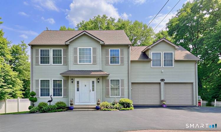 Welcome to this charming Colonial, beautifully set on 1.