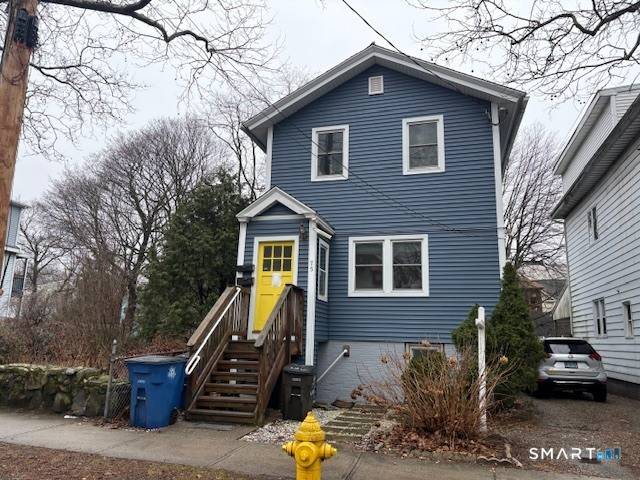 This well maintained East Rock two family house is on a quiet one way street.