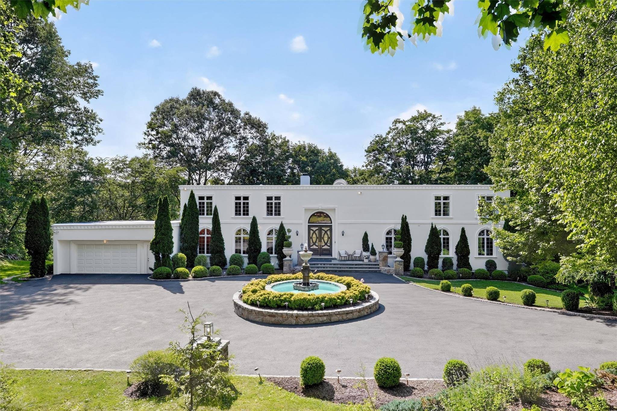 Stunning contemporary masterpiece on Gifford Lake with lavish amenities and serene surroundings.