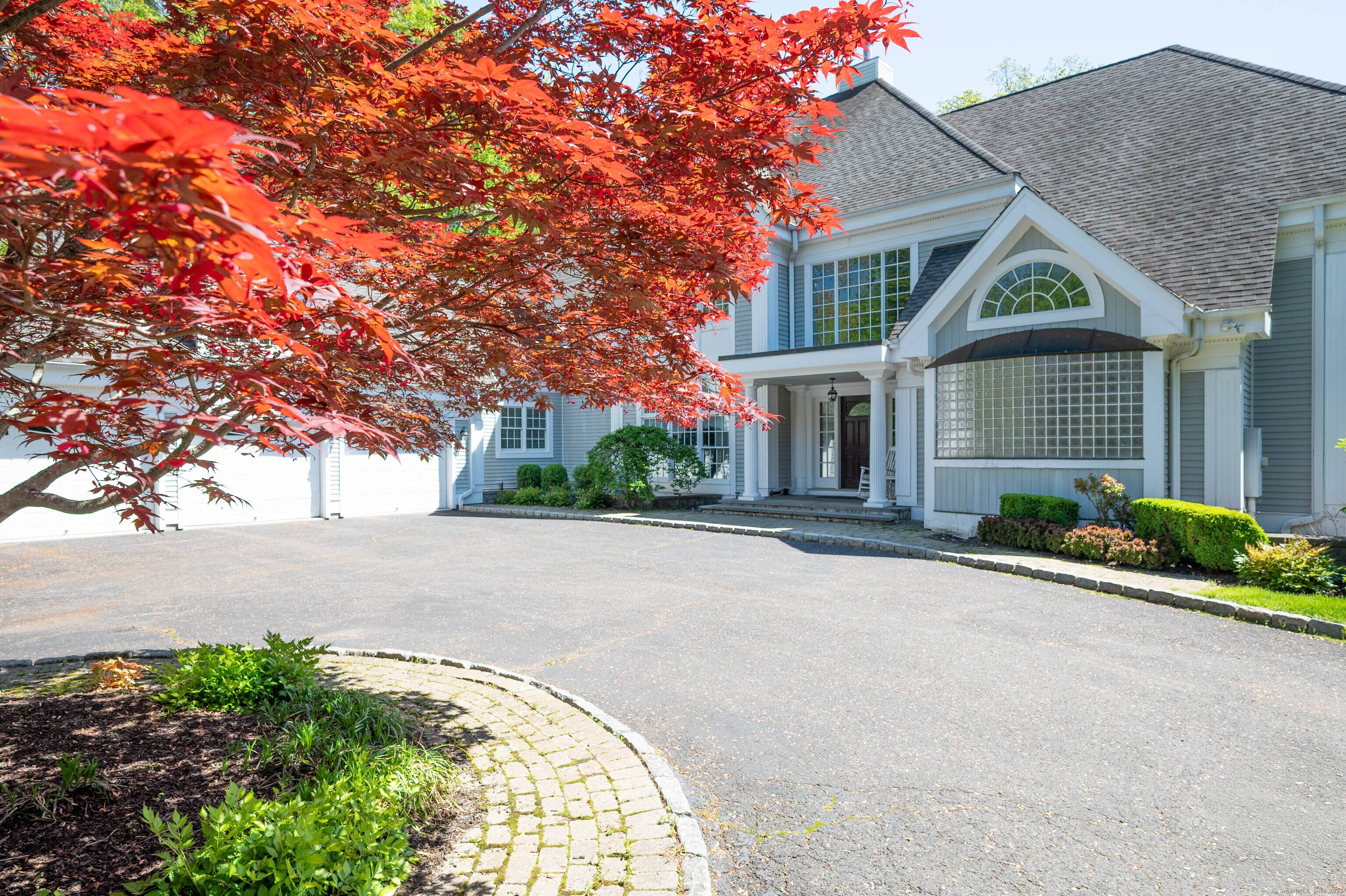 Custom built Colonial offers over 7500 sq.