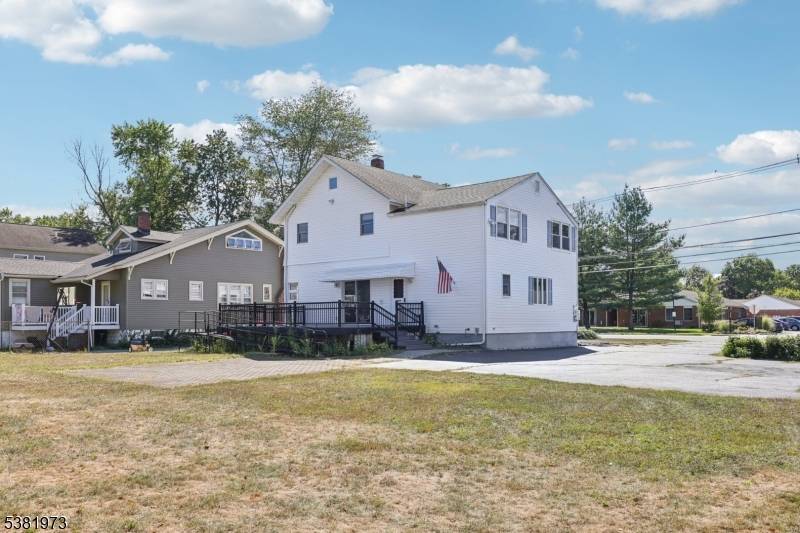 Step into timeless charm with this spacious 5 bedroom, 2.