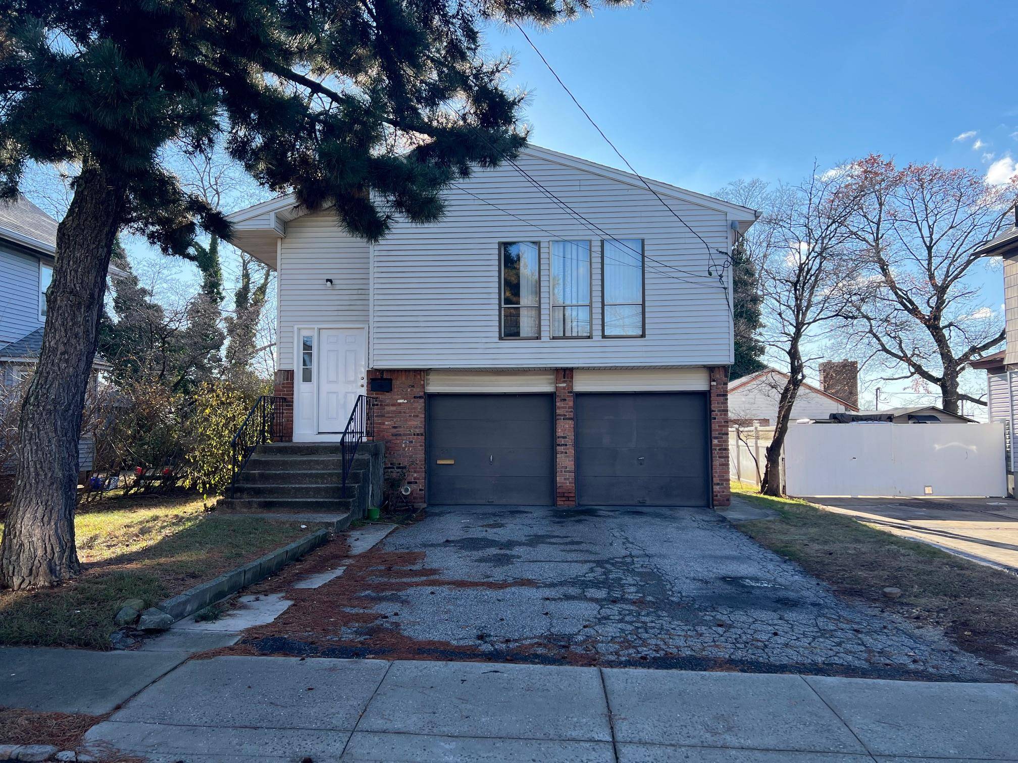 Hi Ranch featuring four bedrooms, two full baths, large kitchen, bright and open living space.