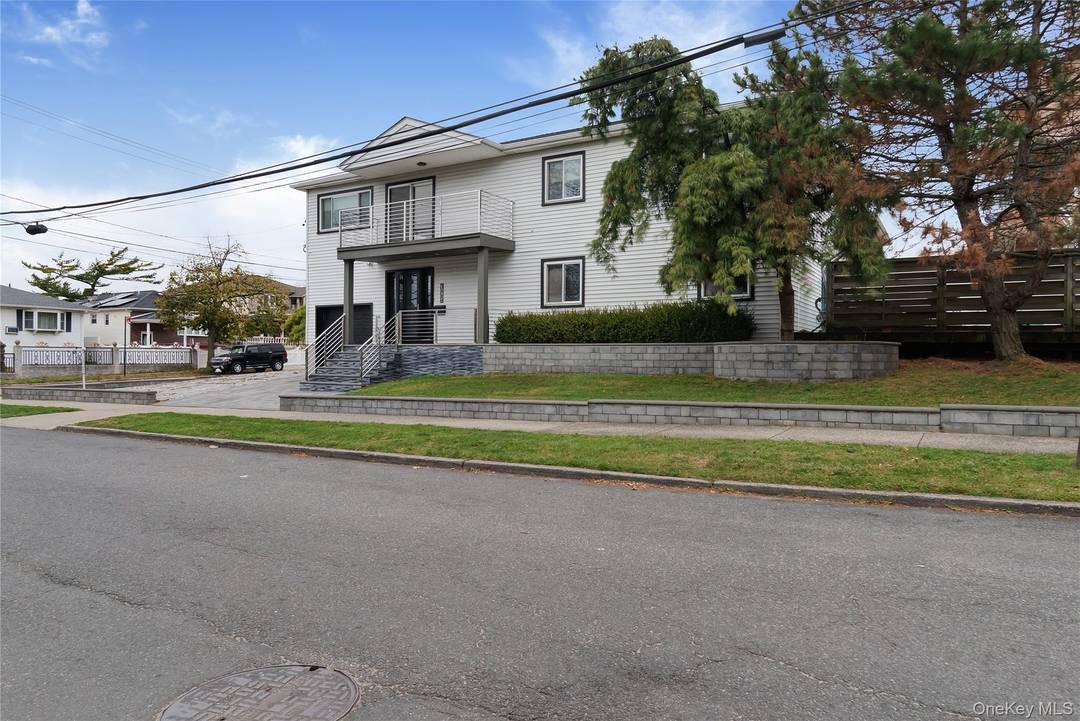 Discover this exceptional corner lot colonial, a rare opportunity in one of Bayswater s most desirable enclaves of the Rockaways.