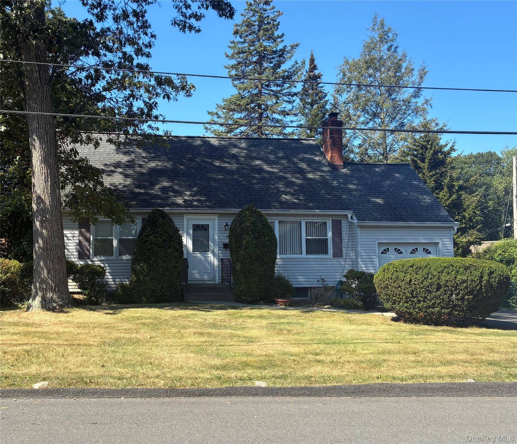 Welcome to 85 Lt Cox Drive a spacious and well maintained Cape Cod in the heart of Pearl River !