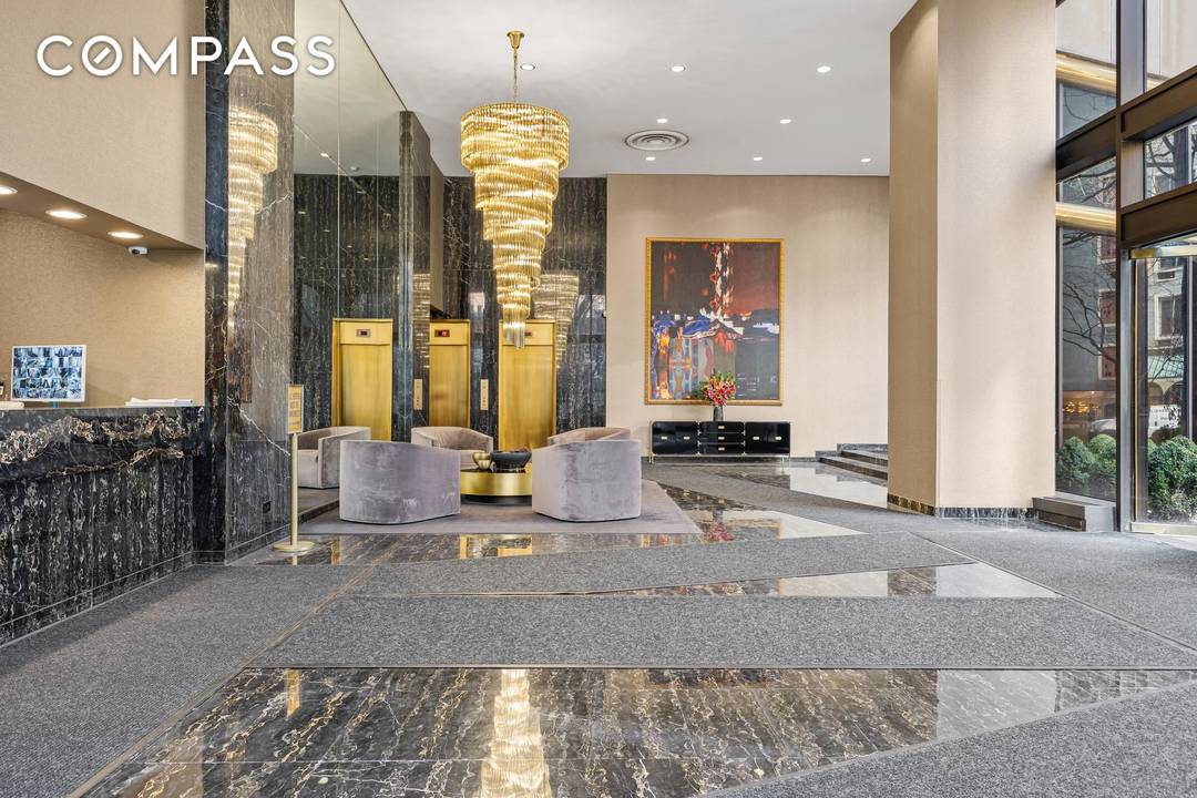 Welcome to 167 E 61st St, a stunning oversized 2 bedroom, 2.