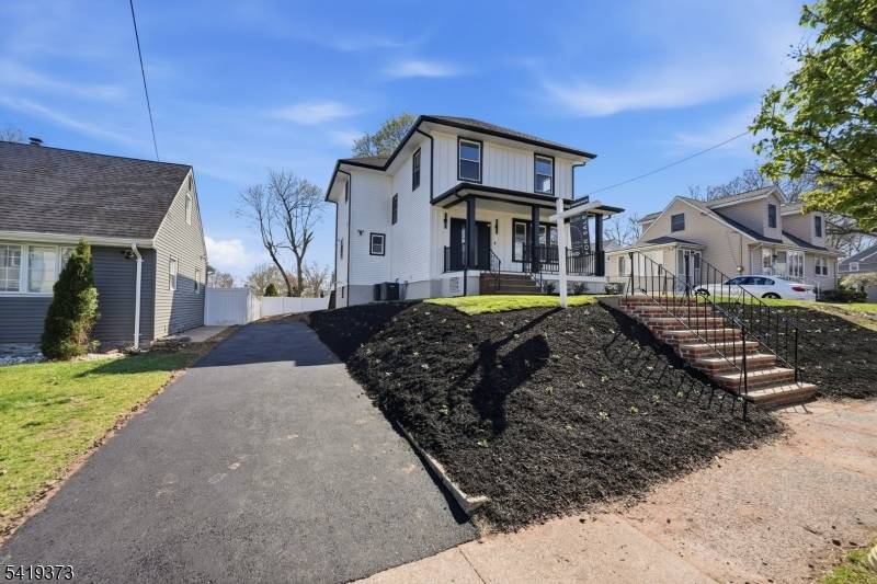 Brand new from roof to yard, this stunning Oak View home seamlessly blends modern upgrades with timeless design.