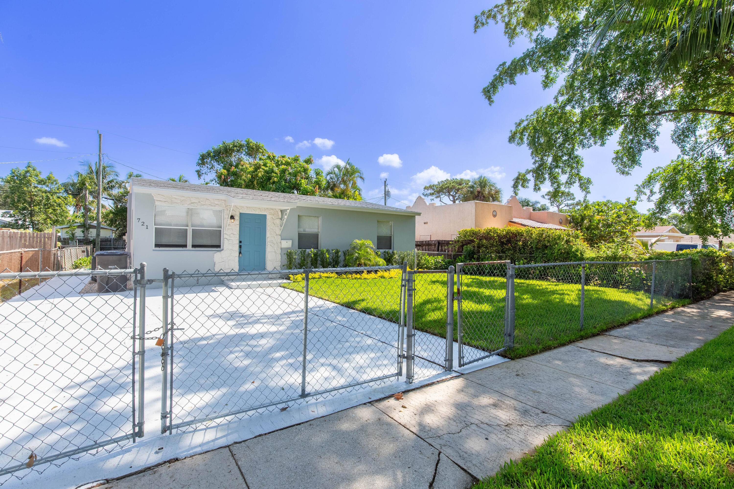 This impeccably renovated three bedroom, one bathroom house offers modernized comfort and style plus a brand new roof.