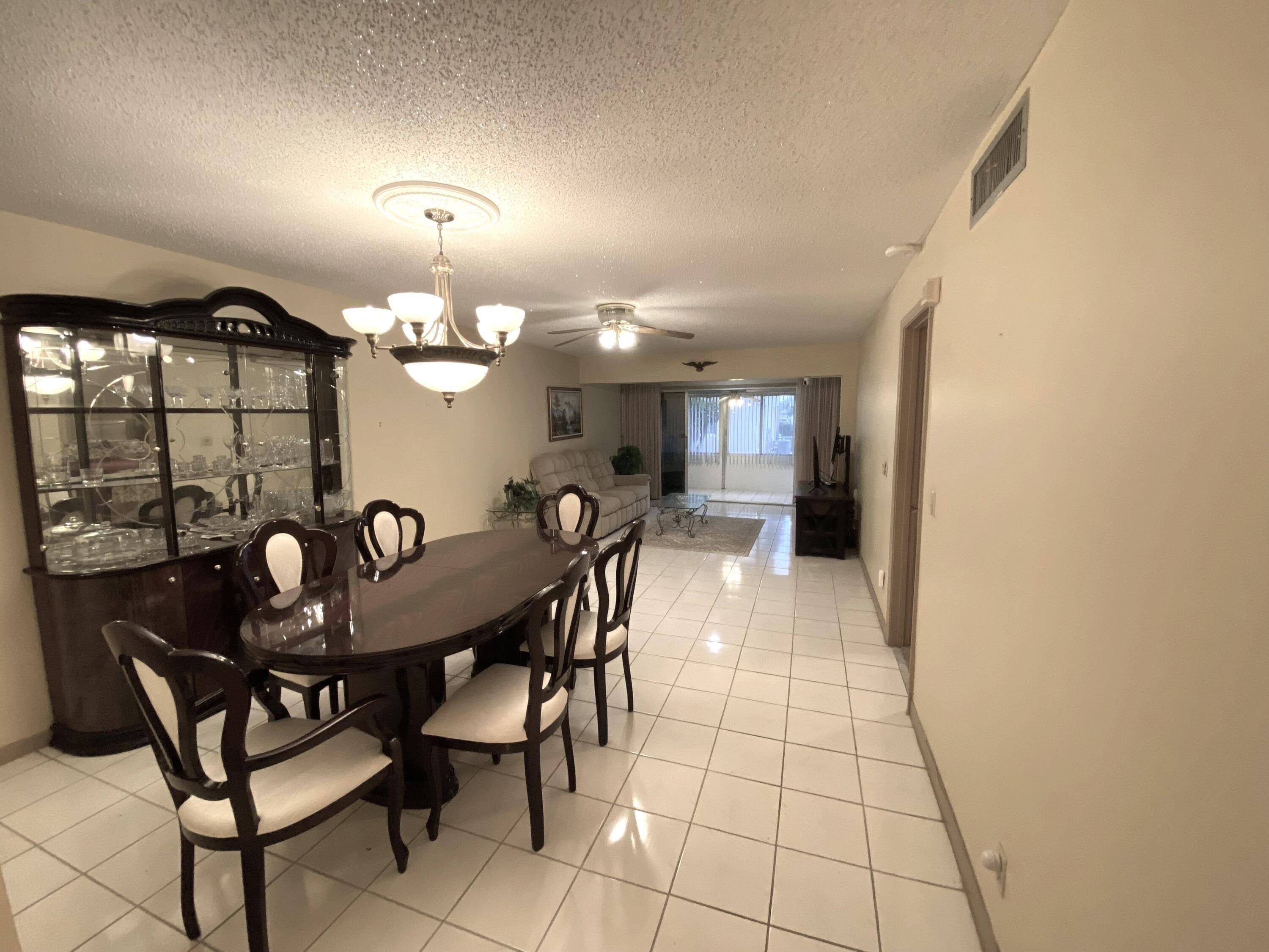 PINES OF DELRAY. Contemporary and highly sought after 1st floor corner 2 bedroom 2 full bath condominium spanning 1167 sqft under air plus a 128 sqft screened and windowed patio ...