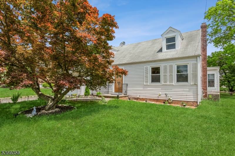 Welcome to 8 Longfellow Drive, a beautiful Cape Cod style home located in the highly sought after Colonia Estates section of Woodbridge Twp.
