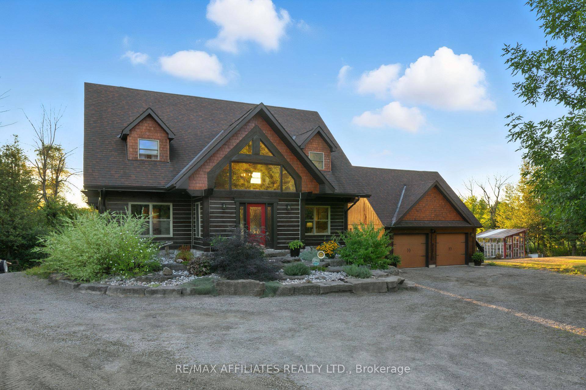 Welcome to the log home that redefines country living.