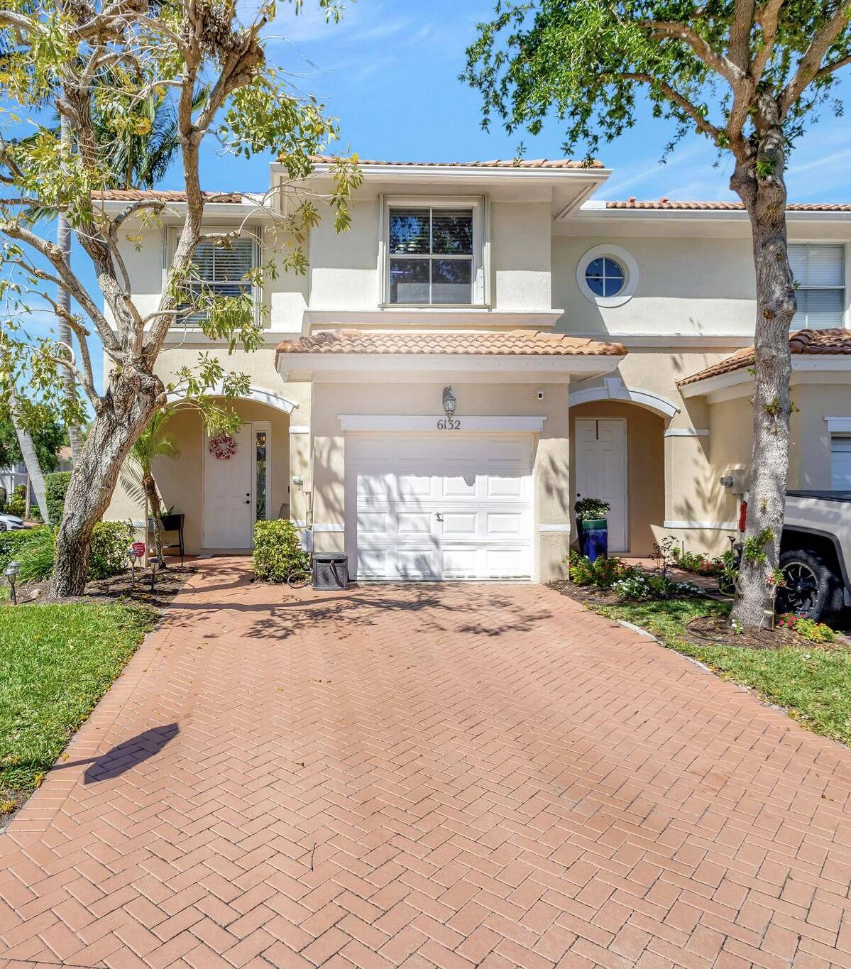 Fantastic opportunity to own one of few large end unit, 3 Bedroom Townhomes in the gated community of Seminole Gardens.