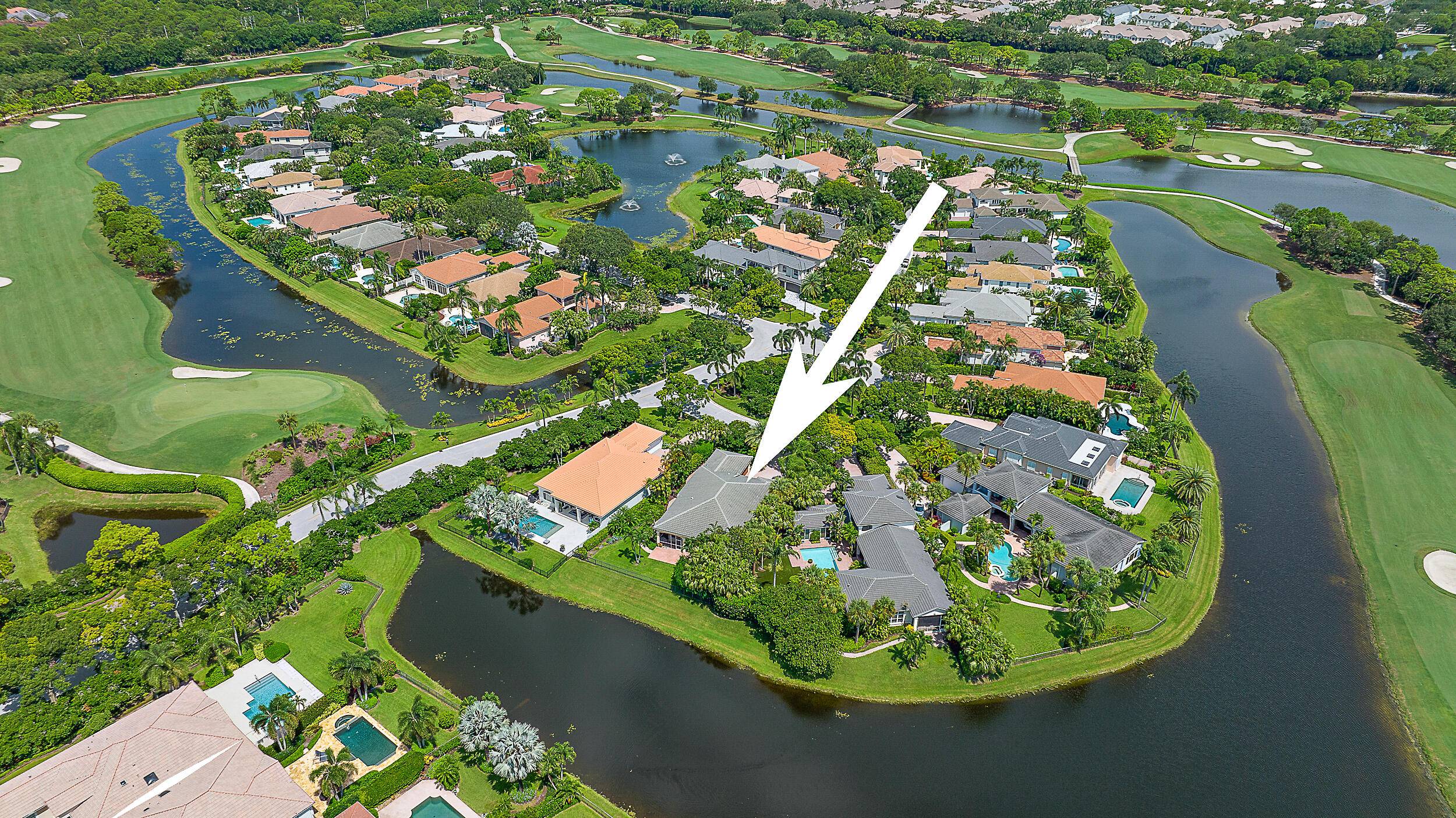 This charming furnished 3 bedroom, 3 full bath home offers tranquil water views in a serene setting perfect for relaxing or entertaining from the enclosed outdoor patio surrounded by lush ...