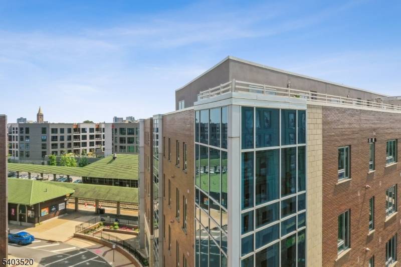 This Modern and Stylish corner unit is awash in sunlight and is a Commuter's Dream, steps to NJ Transit and 30 min into NYC !