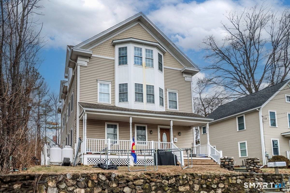 Multi family home located in the heart of New Milford, offering a walkable location close to the Village Green, train station, shopping, dining, theater, parks and local amenities.