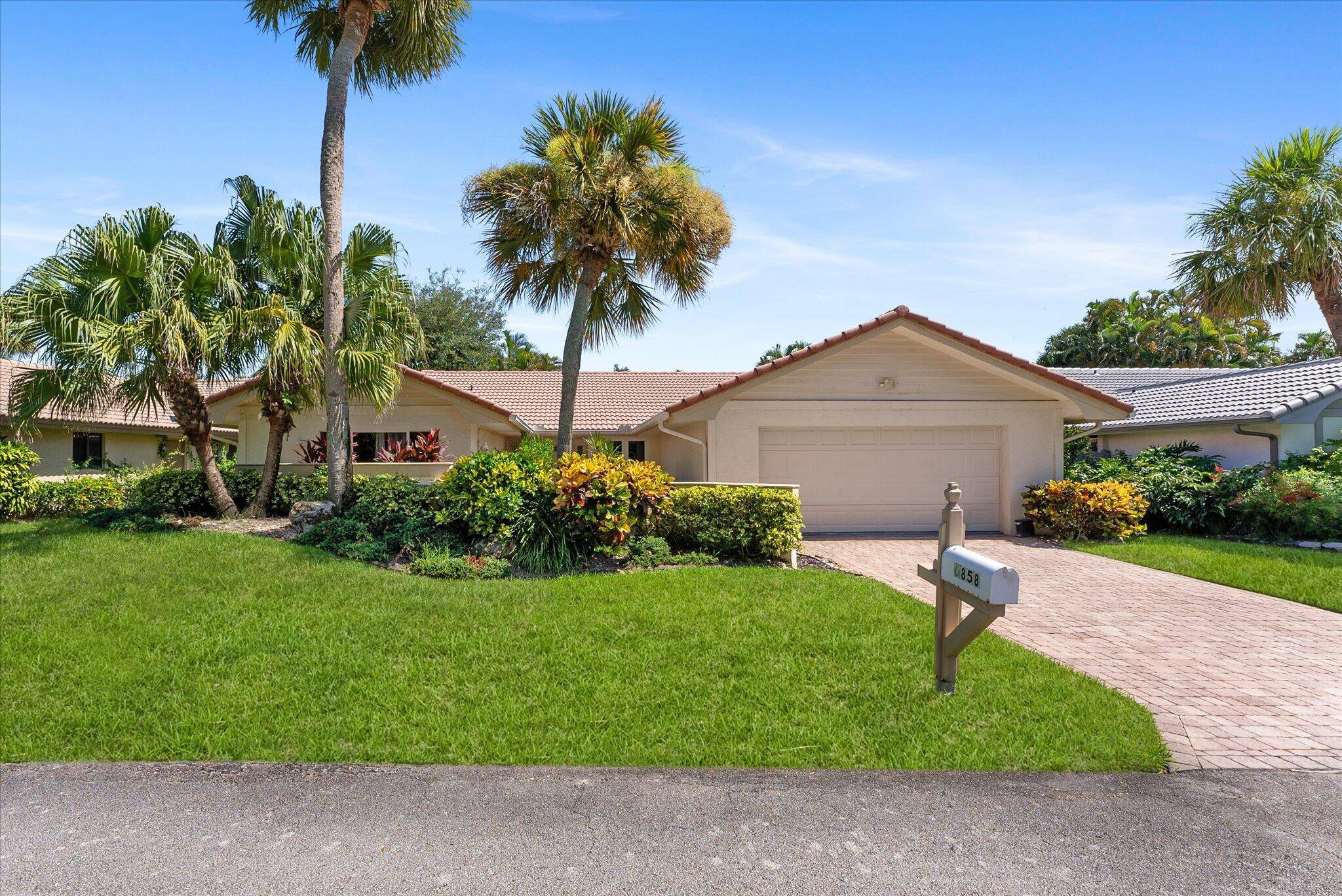 STUNNING ! Remodeled Home With Exquisite Finishes Complete Hurricane Impact Windows and Doors A Rated Schools Highly Desirable Boca Del Mar Bright Open Layout Split Floor Plan Vaulted Ceilings LED ...