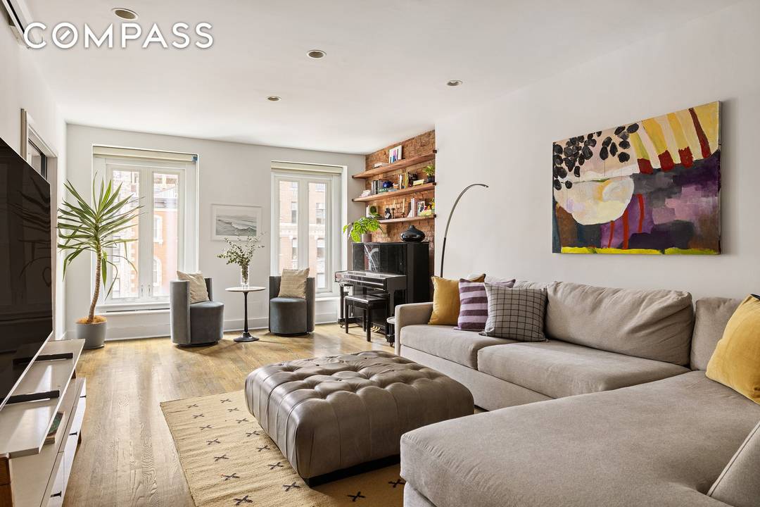 Sun drenched and lofty, 318 2nd Avenue, Unit 4 offers a massive prewar 2 bedroom, 1 bath apartment with separate living room and sunken dining area spanning approximately 36 combined.