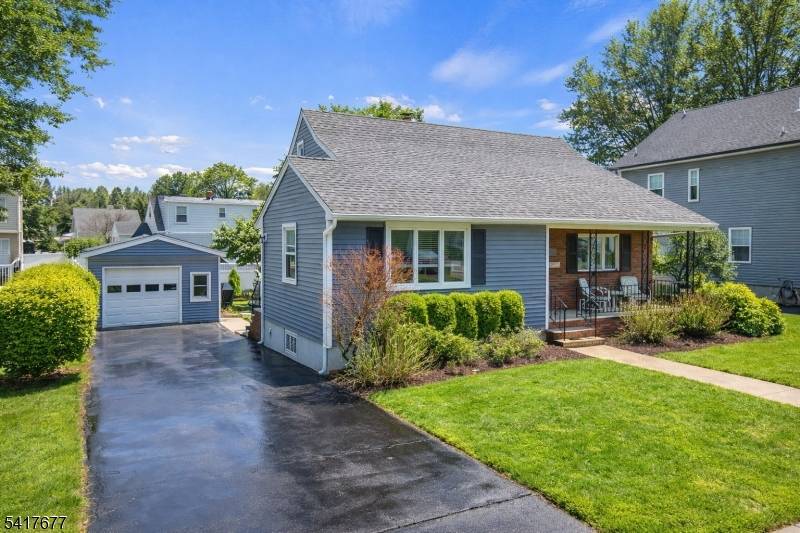 Welcome to this beautifully expanded Cape Cod home in the highly sought after Maple Hill section of Clifton !
