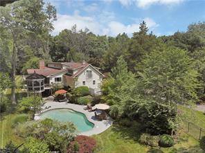 Greenwich Back Country residence sited down a country lane on secluded 4.