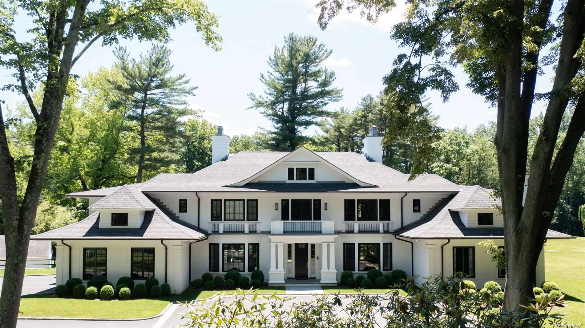 Lily Pond, designed in 2018 by Kean Development is an unparalleled brick timeless, modern home that incorporates today's finest luxurious amenities.