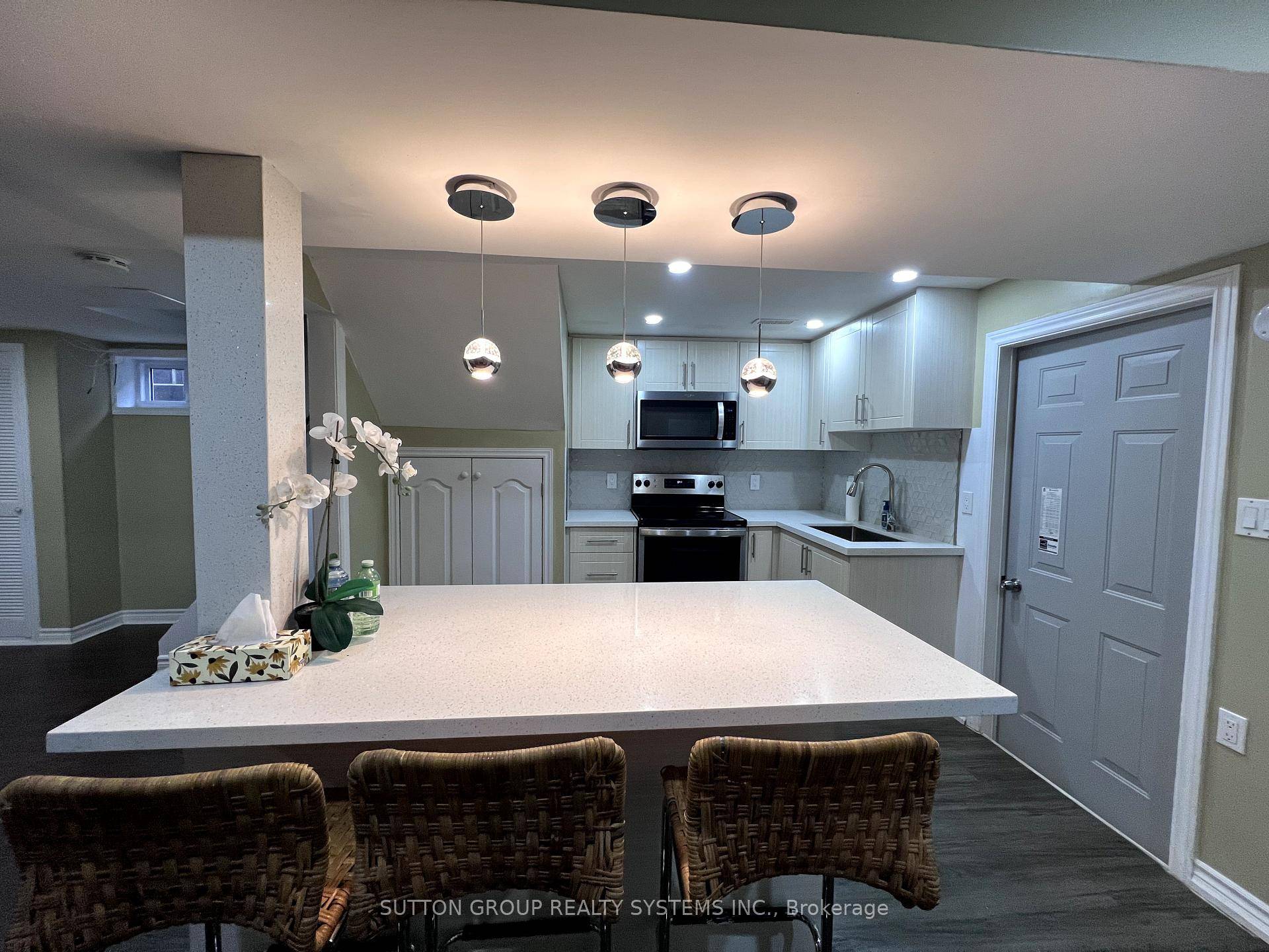 Bright and Updated 2 Bedroom Plus Den Basement Apartment.