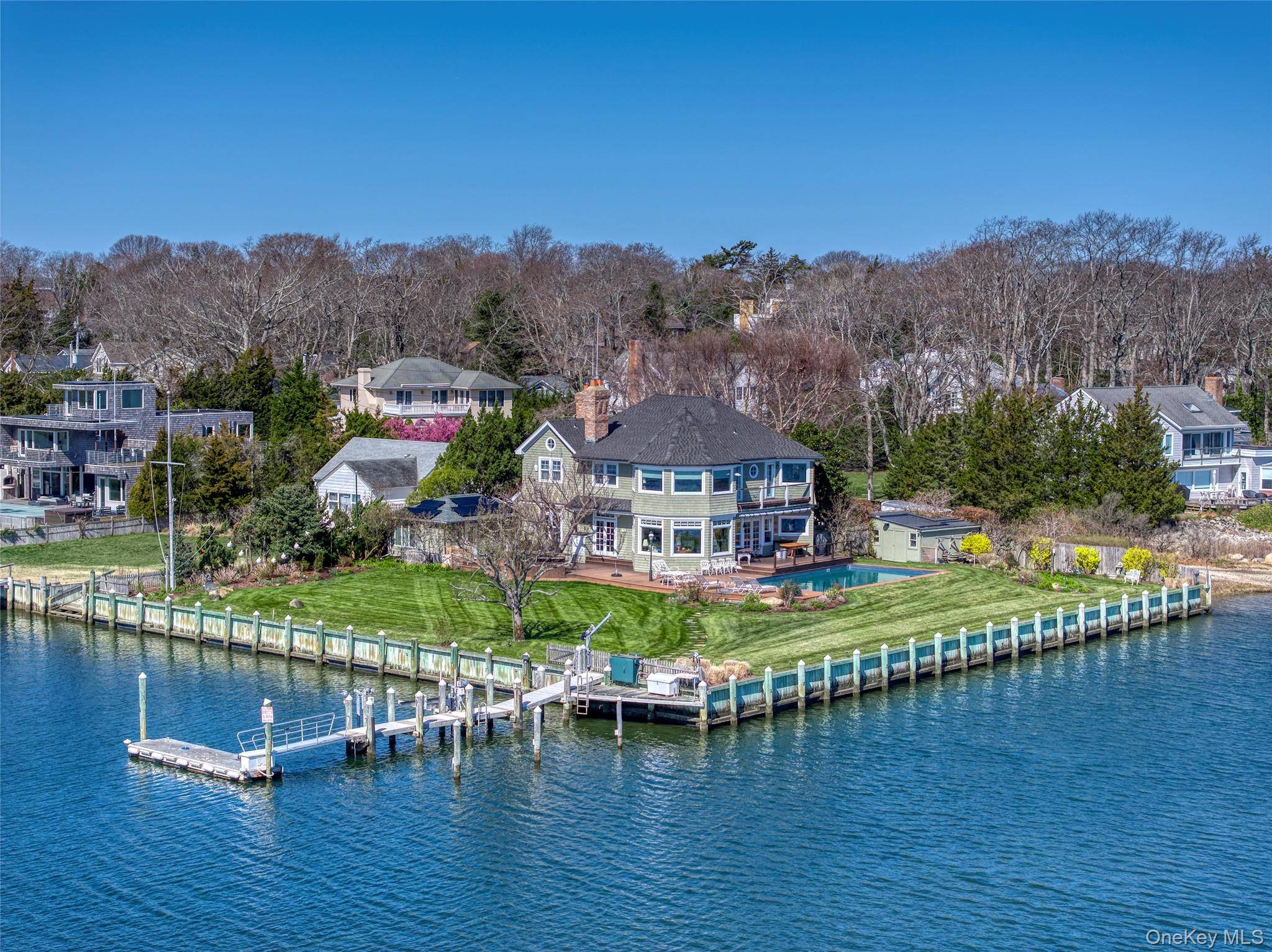 Waterfront boaters' paradise with a full service deep water dock and access to Sag Harbor Bay awaits your arrival.