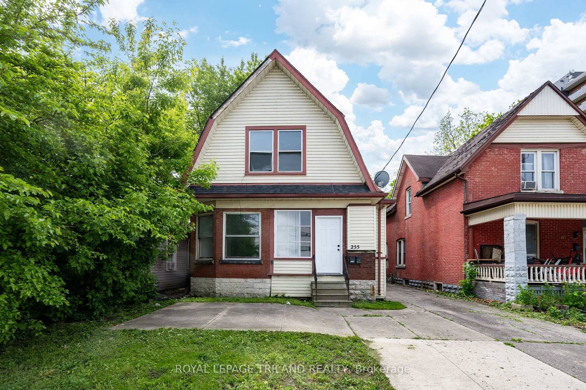 Welcome to this delightful red brick century home nestled in the sought after SOHO neighbourhood, just a short stroll from downtown.