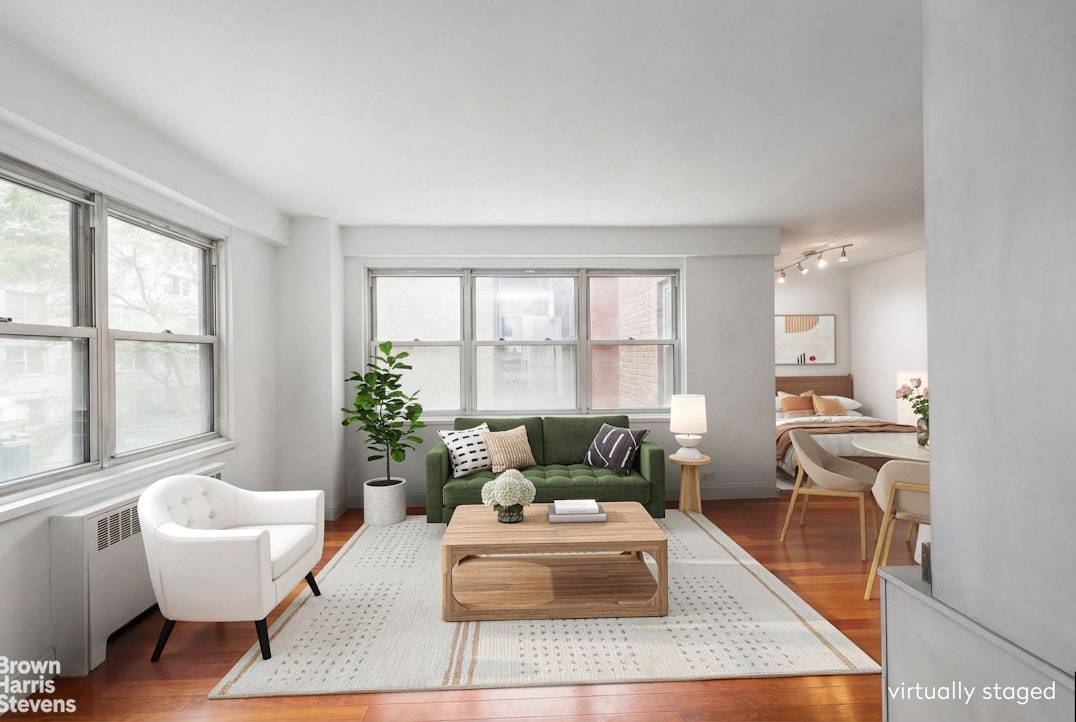 CORNER, CUSTOM RENOVATED ALCOVE STUDIO in DM BLDG !