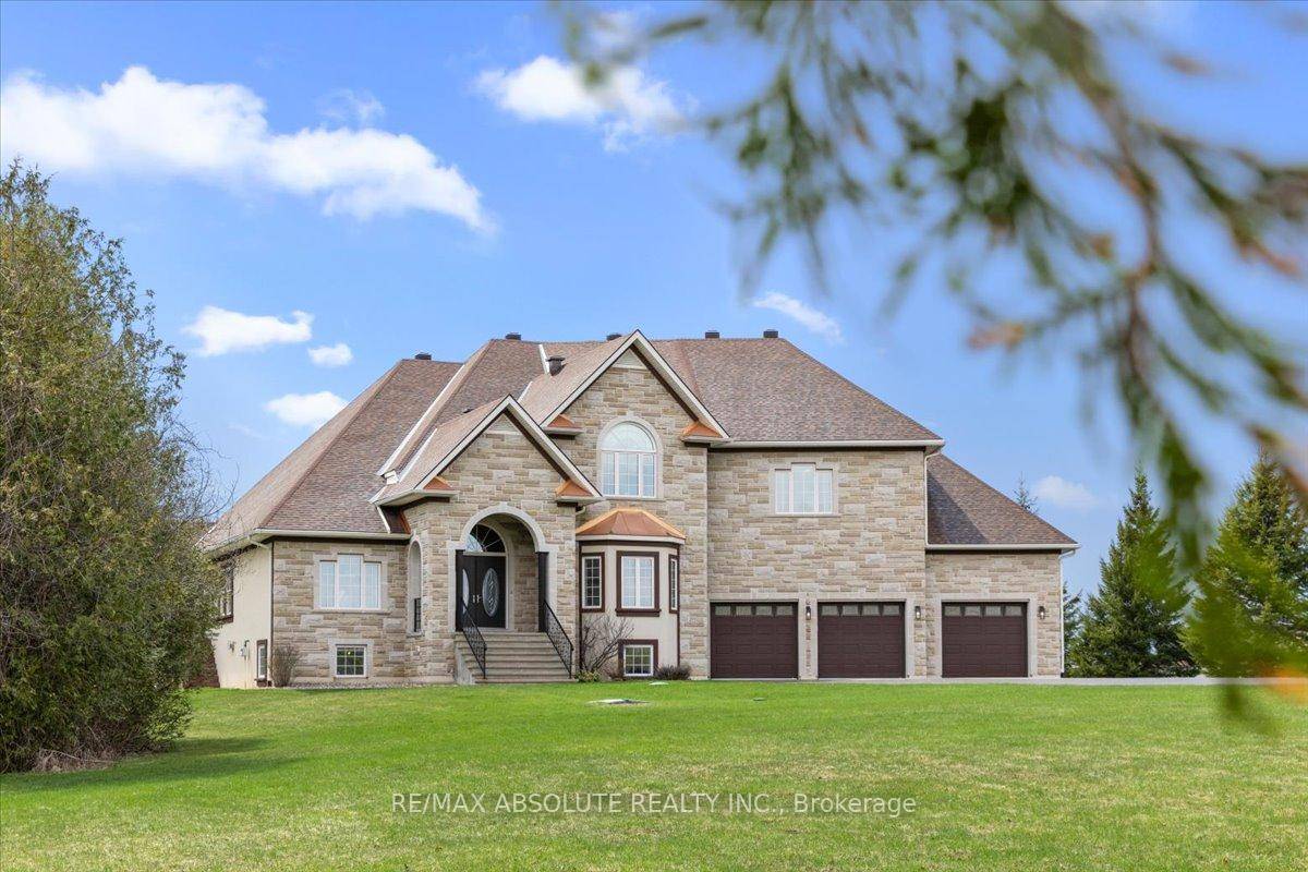 OPEN HOUSE FRIDAY 5 7 ! A long paved driveway guides you this custom mansion that is 4 stops signs from Stittsville Main Street, a short drive allows you to ...