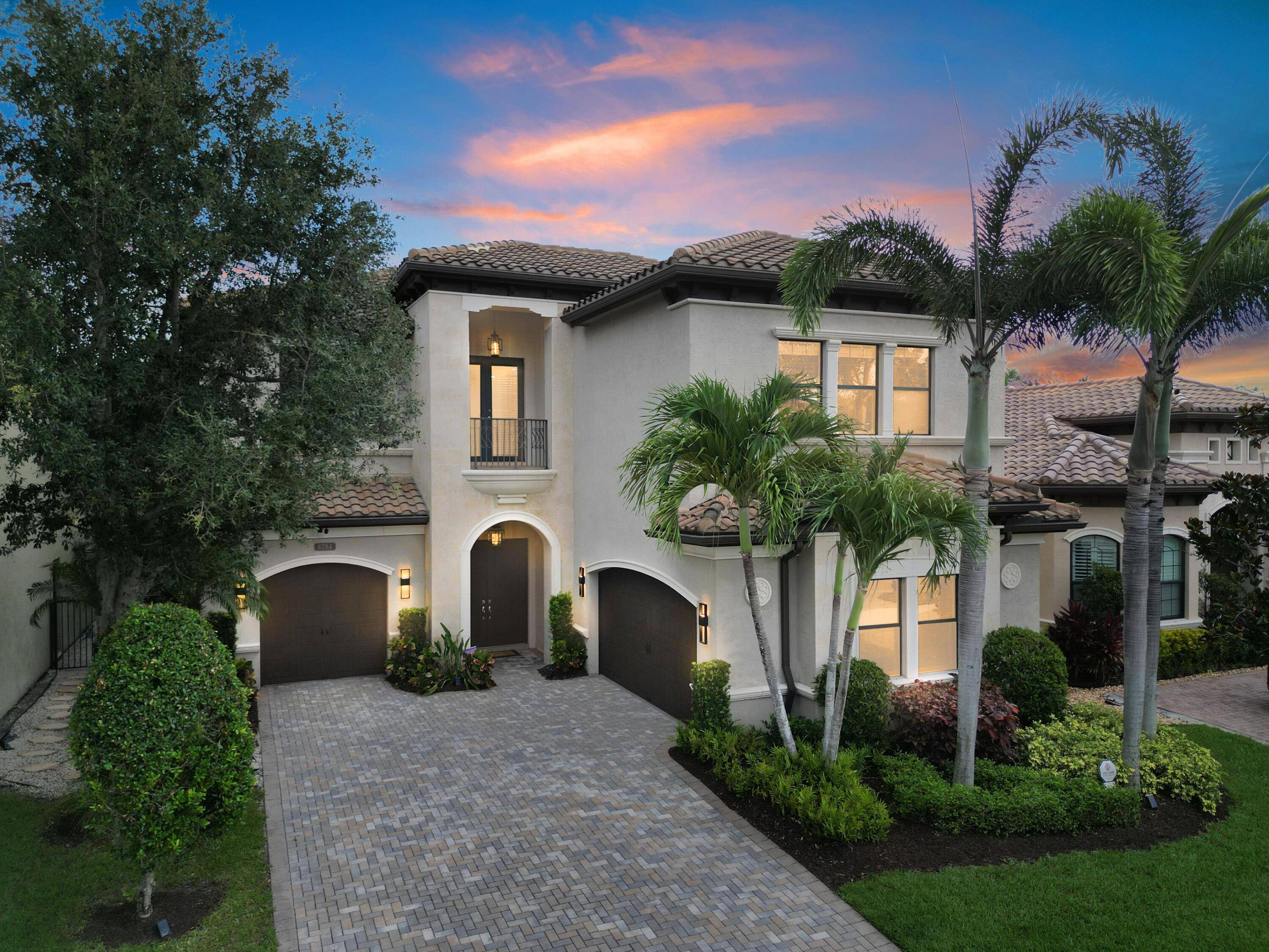 Situated in The Bridges, one of South Florida's most desirable gated communities, this recently remodeled grand residence has an open contemporary floor plan.
