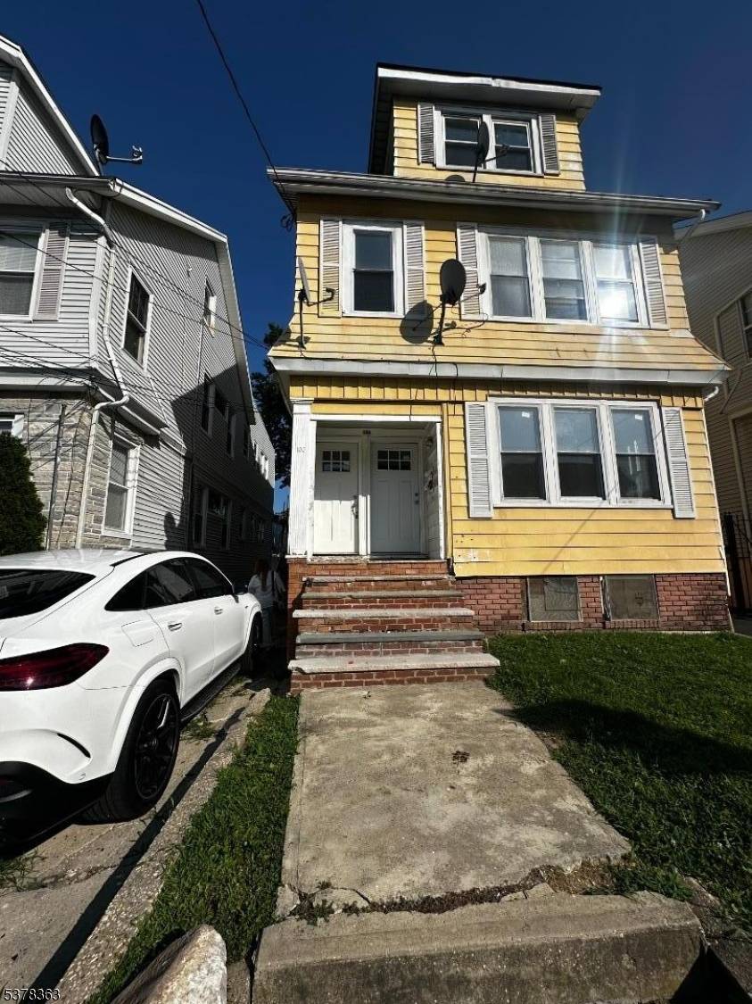 Spacious 2 Family Home with Parking and Investment Potential !