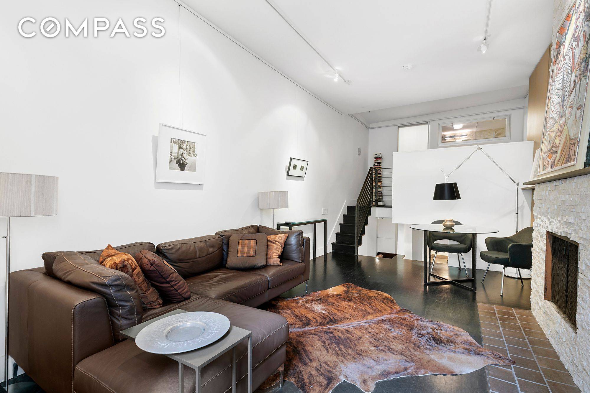 This thoughtfully renovated Gramercy pre war triplex home has style to spare, and features you don't normally find at this price.