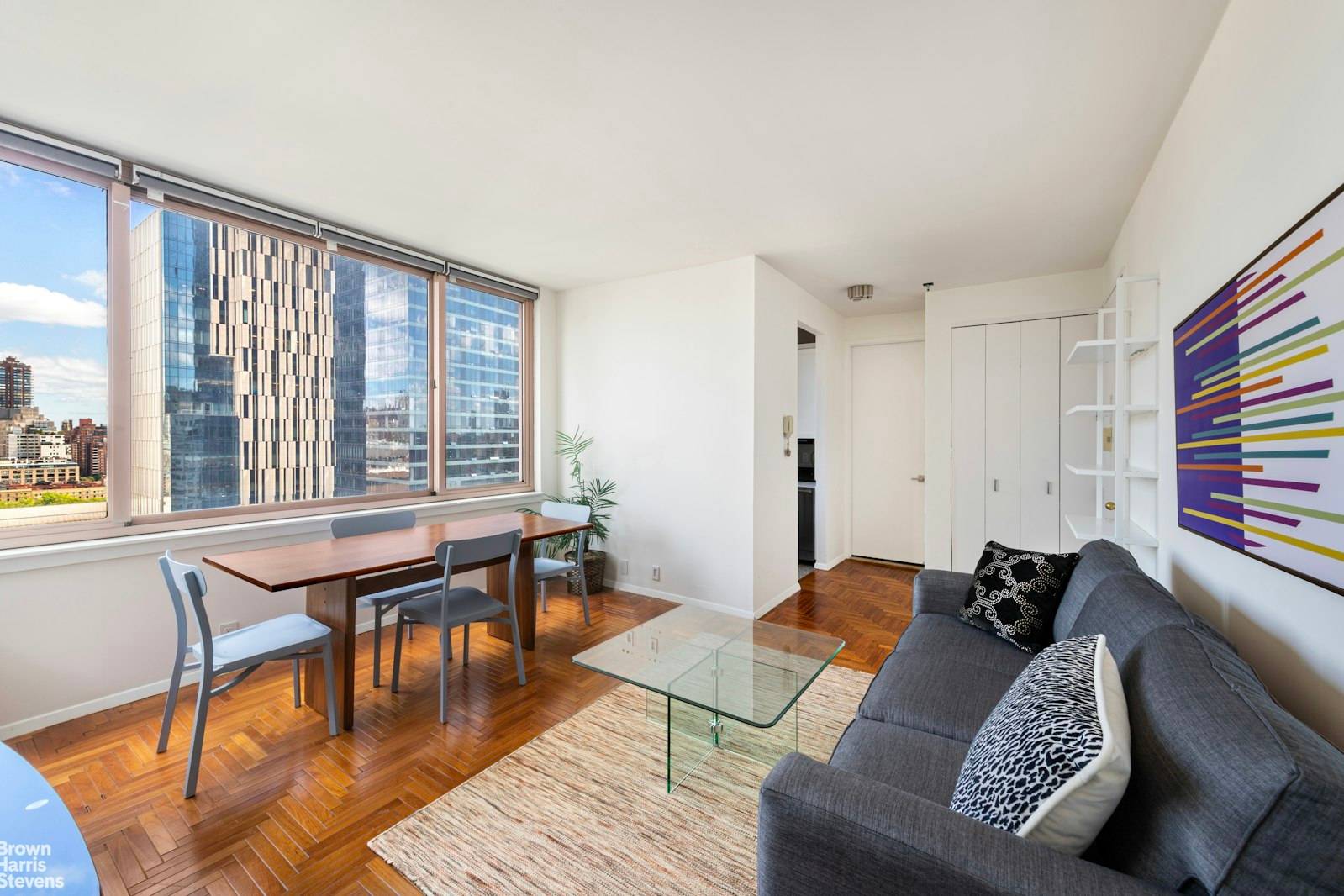 Perched high above on the Twenty third floor, is this spectacular one bedroom, one full and one half bath home located at the Belaire Condominium in Lenox Hill.