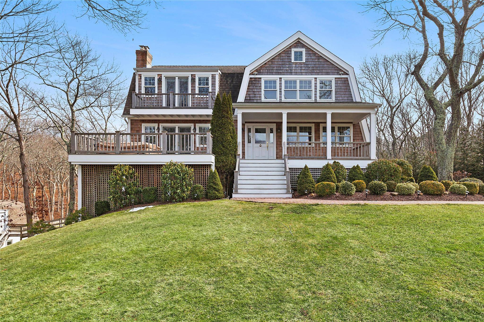 Welcome to 22 Old Trail Road, a charming beach cottage style residence tucked away in the tranquil town of Water Mill, NY.