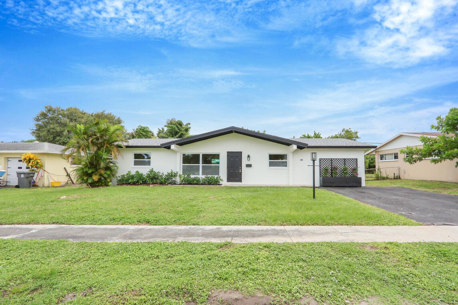 Beautifully remodeled single family home, move in ready, 3 Bed 2 Bath featuring New Roof 2025, Impact Windows and Doors 2025, All new flooring, bathrooms, AC unit, water heater.