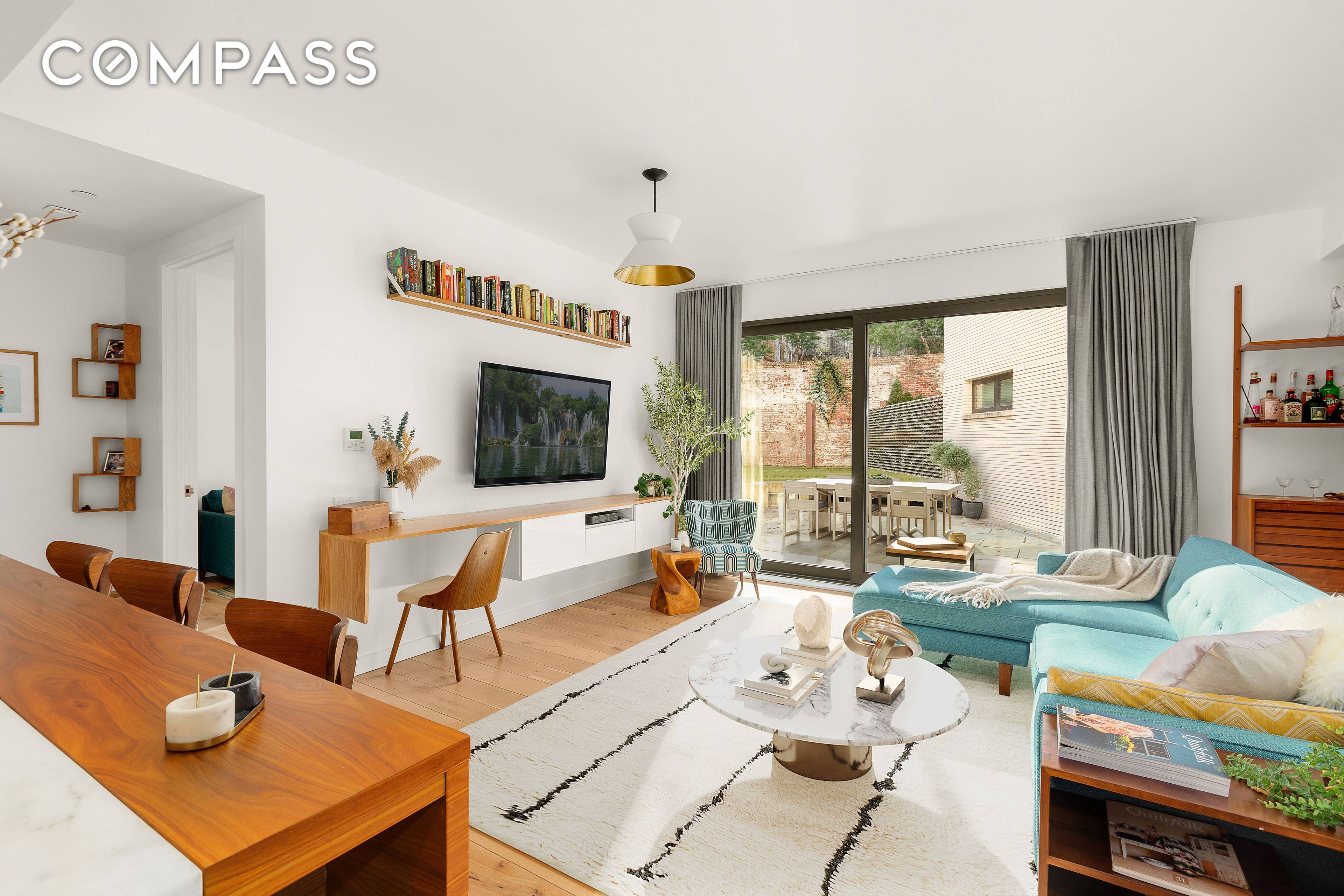 Elegant, Modern 4 Bedroom, 3 Bathroom Townhouse Style Duplex within a Luxury Condominium with Incredible Private Yard and Terrace in Prime Prospect Heights Welcome home to the best of both ...