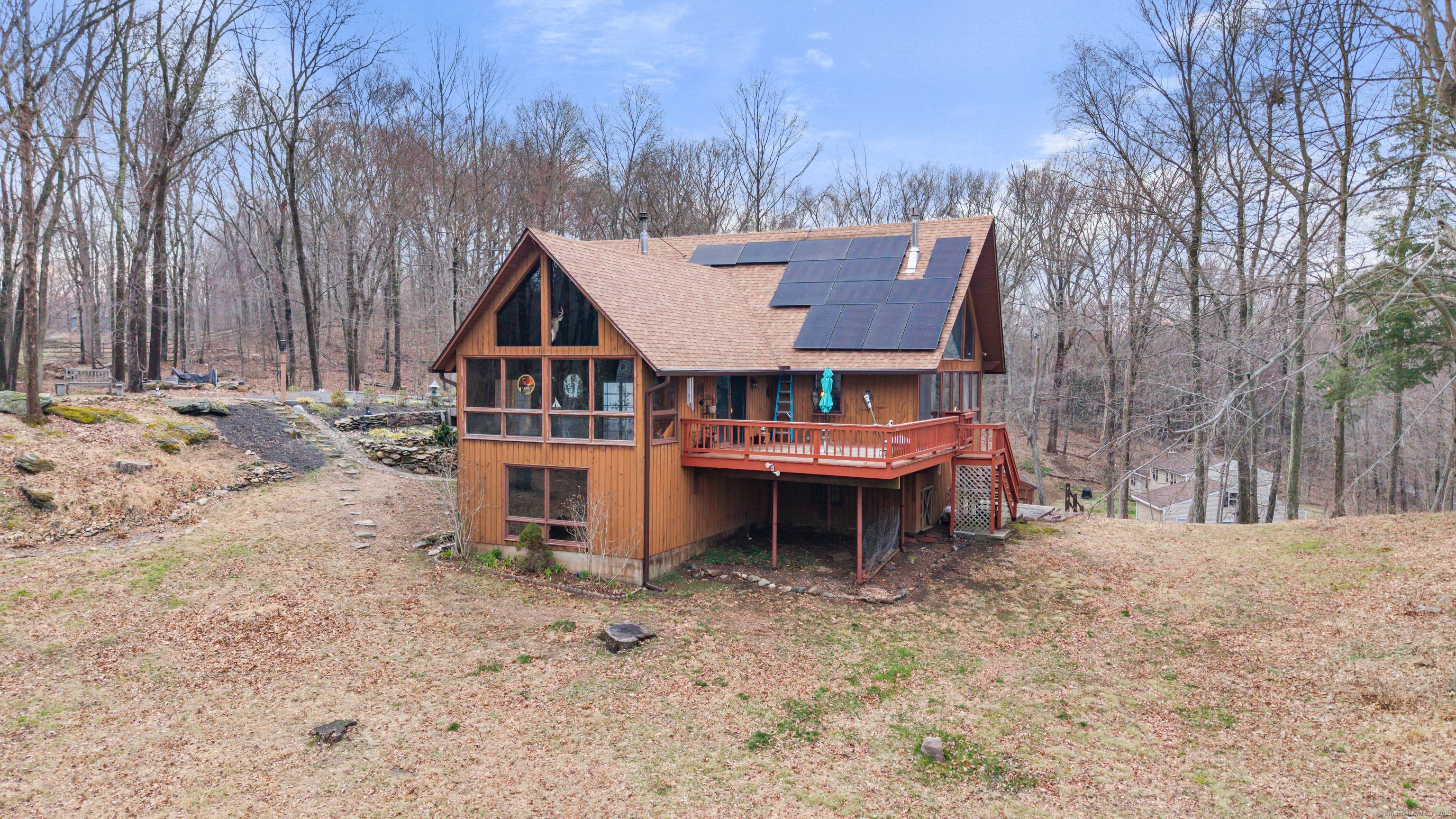 Peaceful, serene tranquility are just a few words to describe this stunning Contemporary A frame home, set on over 2 beautifully wooded acres with breathtaking views.