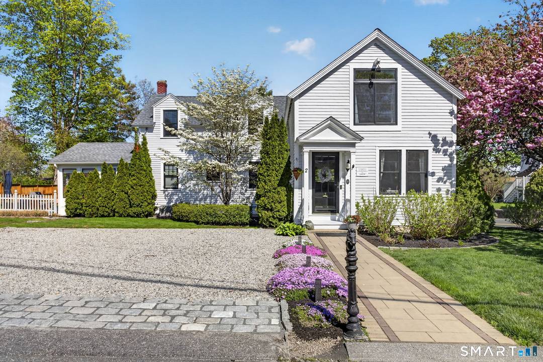 Nestled in one of the most coveted neighborhoods of Historic Downtown Mystic, this exquisitely reimagined Carriage House at 2 Elm Street beautifully blends timeless New England charm with refined modern ...