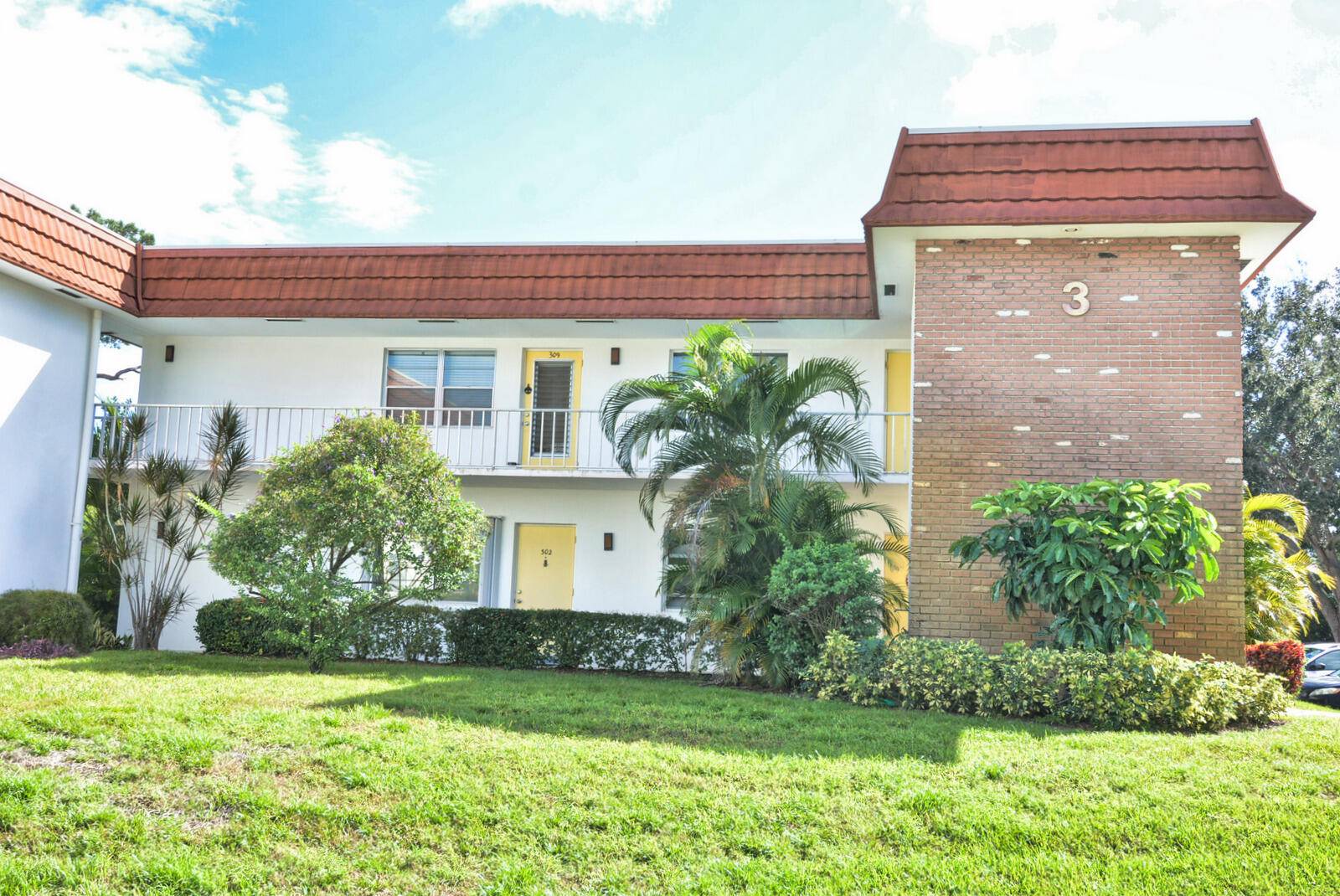 Just bring your bathing suit and golf clubs and be right at home with updates including flooring, A C and HWH, Plantation shutters, decorative fireplace and more !