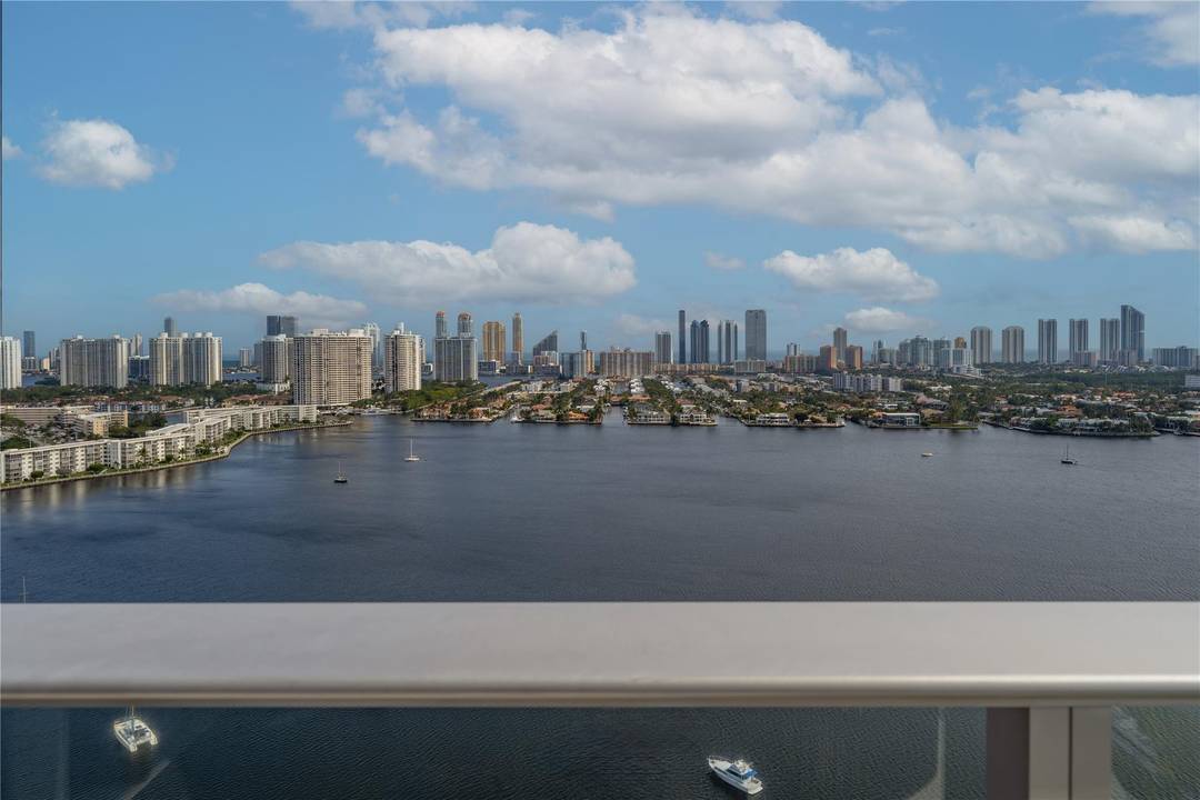 EXTREMELY RARE OPPORTUNITY TO OWN THE SOUTHEAST CORNER DOUBLE UNIT PENTHOUSE IN THE 5 STAR LUXURY YACHT CLUB THE MARINA PALMS !