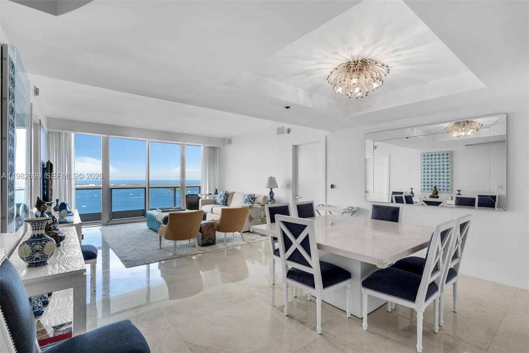 Enjoy breathtaking water views from this beautifully remodeled 2 bedroom den, 3 bath residence at the iconic Jade Residences in Brickell.