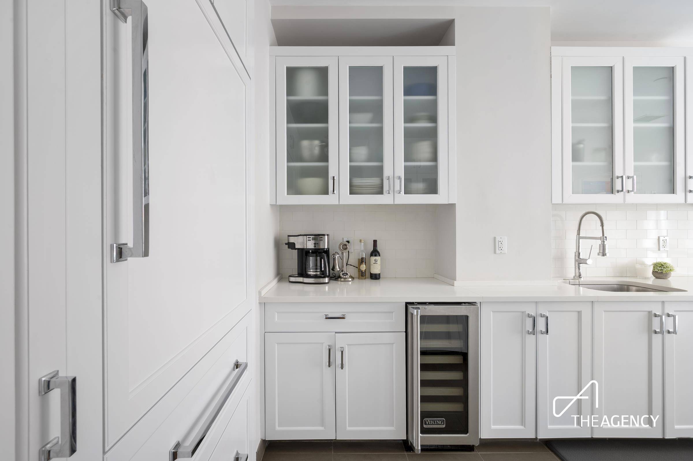 Welcome to this sun drenched, impeccably designed three bedroom, two and a half bath home at The Harrison.